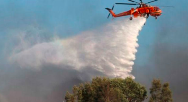 Ilustrasi Helicopter water bombing/Foto: BPBD Riau, BNPB 